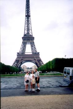 The family at the base of the Eiffel Tower. (2002)