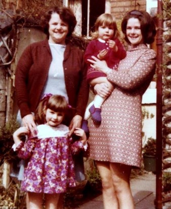Grandma with Barbara, Jane and Helen in the garden at 11, Pittar St. Derby