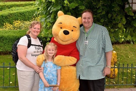 Disney family image with Winnie the Pooh