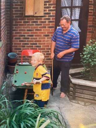 Grandad teaching Jack how to play pool 
