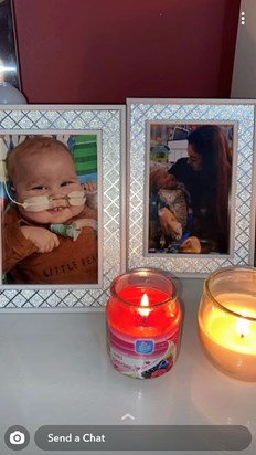 Your auntie Abis bedside - pictures and candles burning for you x