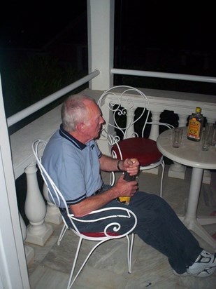 Dad abroad enjoying his voddie