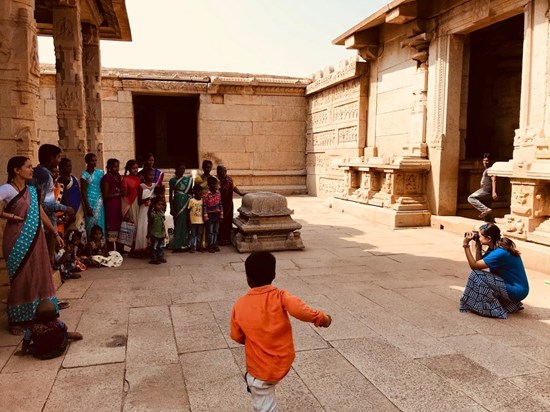 She loved capturing these folks, who seemed native to the region and were touring Hampi, just like us