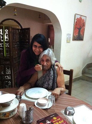 Ghon turns 80 - Rohini serves /feeds her the Payesh ( rice payasam) 2014. 