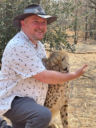 Dad with cheetah in RSA