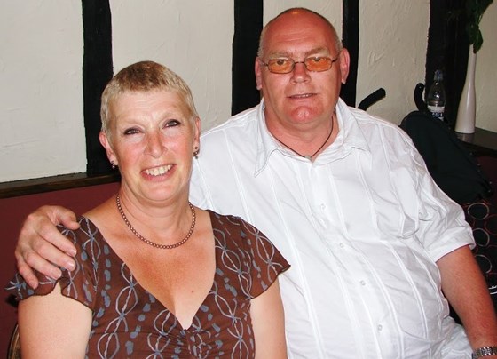 Mum & Dad at the girls christening.  She looks lovely x