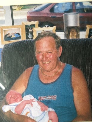 Dad holding Freddie when he was born in July 2003 