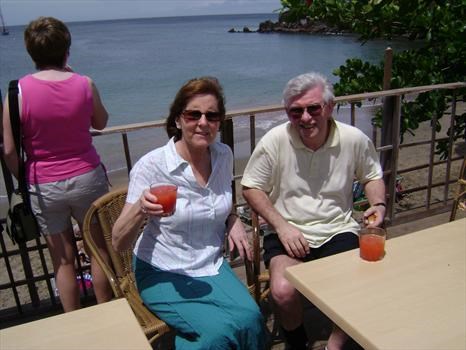Sue and Mike enjoying cocktails in the Carribean