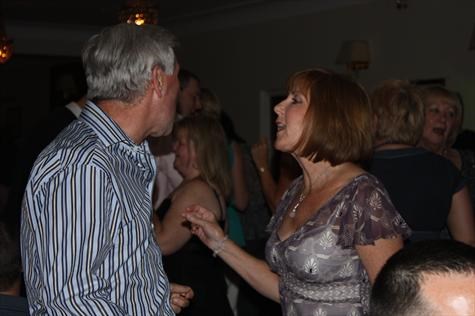 Mike and Sue enjoying a dance on Mike's 60th Birthday