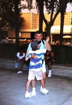 Mike with Melissa dancing on his feet at Universal Studios, Florida in 1997