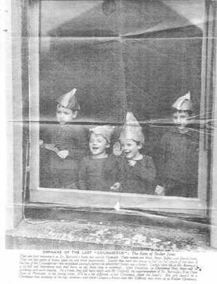 Allan & Peter - David & Robert.  Looking out of the window at Banardos.  Newspaper article.