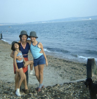 Sheila with her children Lorraine and Graham at the beach.