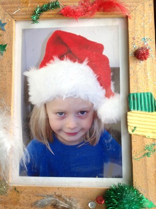 Christmas present (Yr1?) - picture taken by Maria, in frame made by Eloise - so cute!
