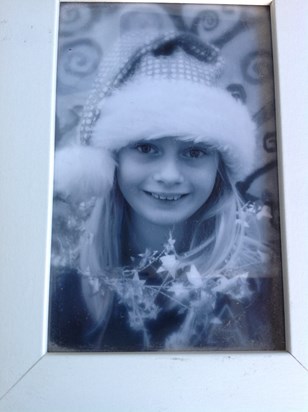 In the silver Christmas hat