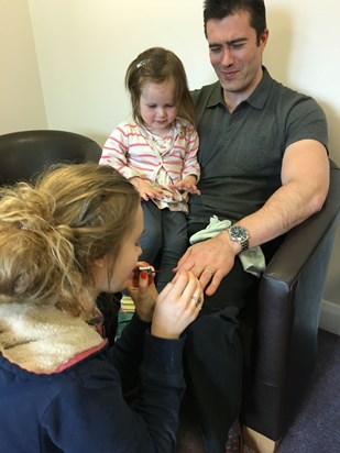 Freddie having his nails done