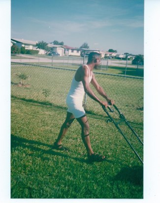 Darryl mowing at our home in Cutler Ridge