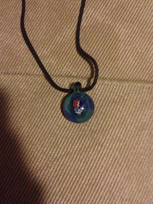 My Grateful Dead pendant we got at The Gathering of The Vibes 2007. I can picture you wearing yours.