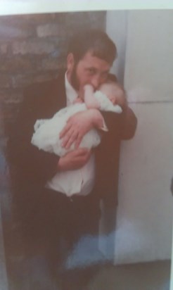Dad and me at my christening 