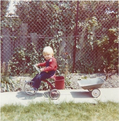 A very young Mike, on Ian's old tricycle, Beach Avenue circa 1975 / 76