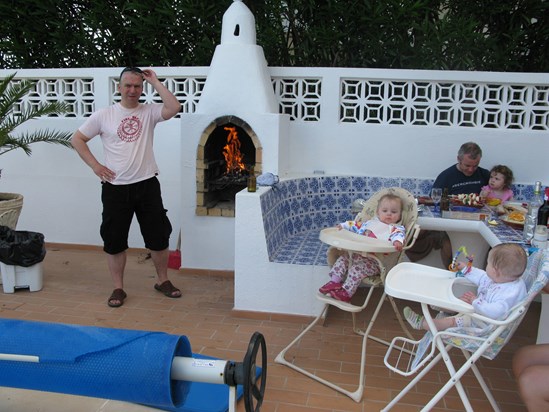 Portugal - man, fire, beer and babies beside the pool