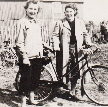 Mystery lady, Mum, and a bicycle ...
