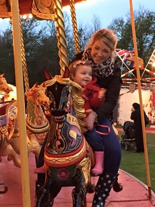 Jess and Lilliah showing her how to ride the gallopers like she use to with you!