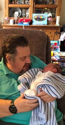 The newest arrival.. John with his youngest Grandson, Toby