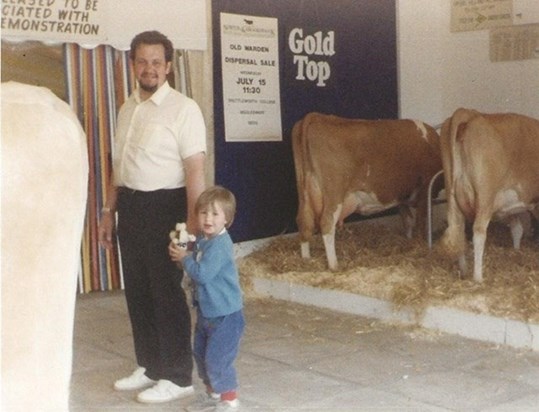 How now brown cow?! John with eldest son, Spencer at the Royal Agricultural Show.  