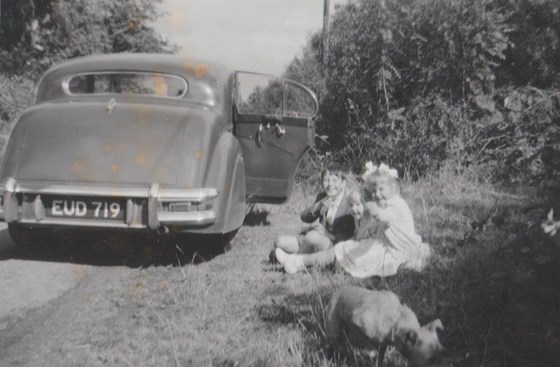 LOL how unusual John beside a car - the family's first a Ford.