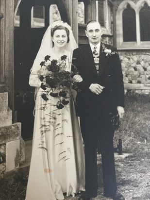 Mum on her wedding day with her dad 1950