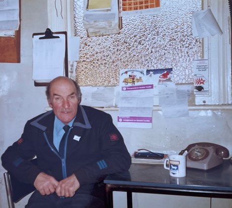 Norman in his office having a well-deserved tea break 