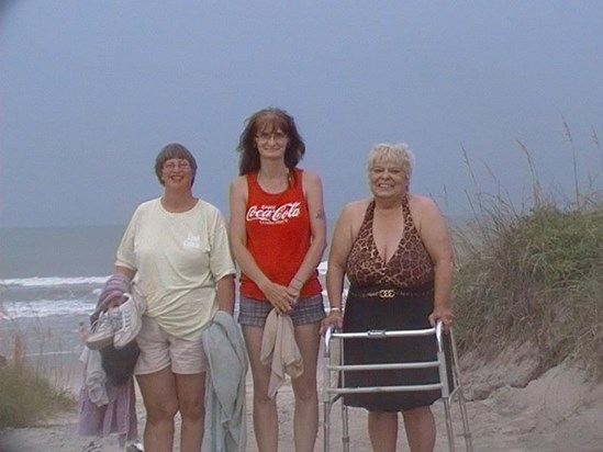 MY STEPMOM ME AND MY MOM LAST YEAR WHEN I TOOK HER TO SEE THE OCEAN