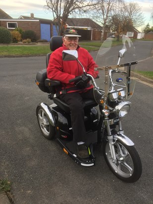 John on his scooter.