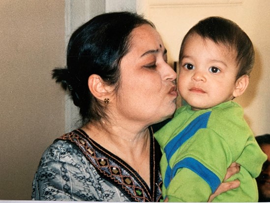 With her grandson Rajiv
