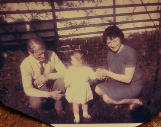 Baby Sharon.   With her mum and grandad. 