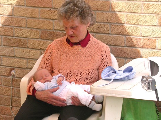 Joyce with one of her twin great grandsons in 2006