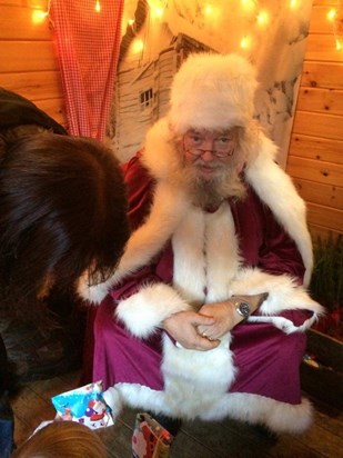 Father Christmas working his magic 