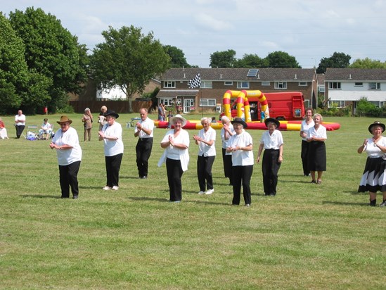 Mum and Line Dancing troupe doing display at Calmore Recreation ground