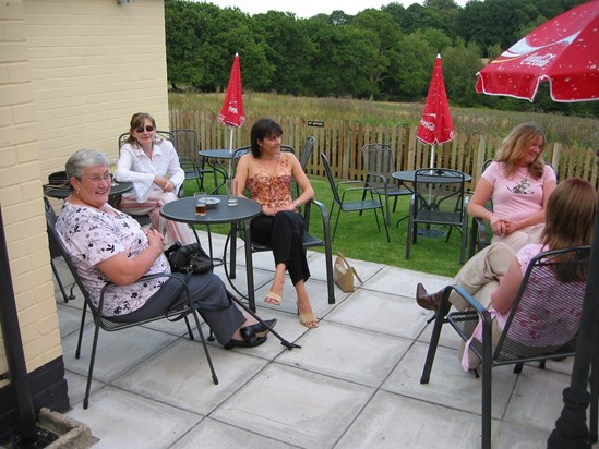 Family enjoying evening drink prior to meal in Hythe, New Forest