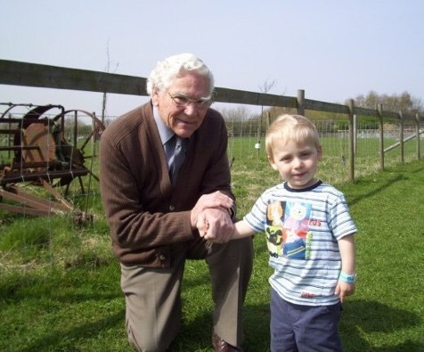 Alex with Grandad Tony at Manor Farm - 2010
