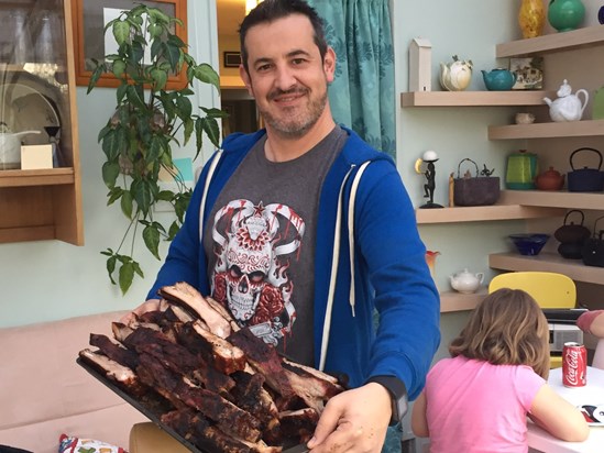 Wes displaying the Famous Dave Brown ribs