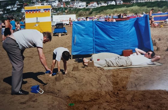 Making a sandcastle on Woollacombe beachach