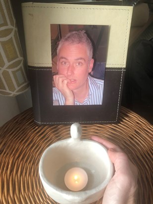 Nigel_a lit candle