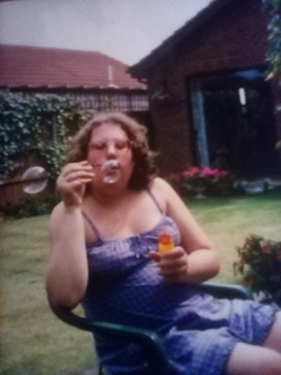 Bubble blowing in nannies garden.