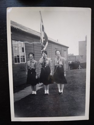 May about fifteen at a guide parade. She is on the left and I am on the right. Happy days!