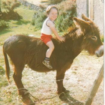 Aidan on Uncle Mickey's donkey in Ireland when he was 4 x