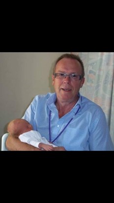 Grandad holding his first grandson Finley on the day he was born xx