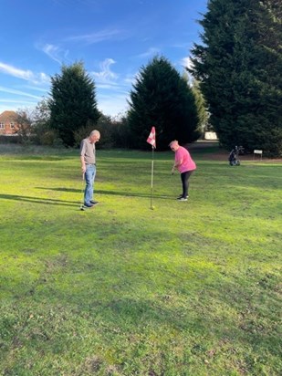 Golfing together last October.