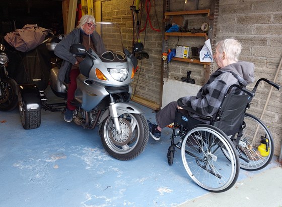 Dad giving advice to a new trike owner