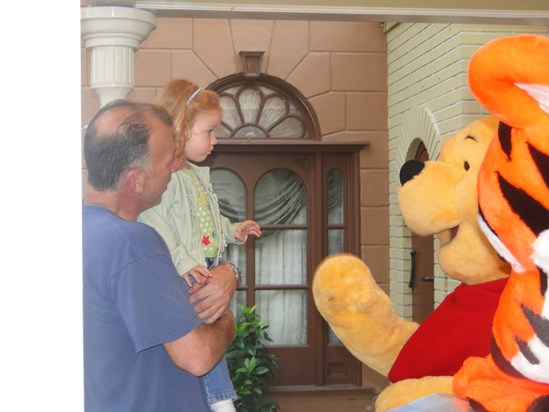 Madison & Daddy meeting Winnie and Tigger.